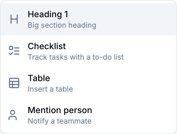Slash command menu showing formatting, table, and mention options