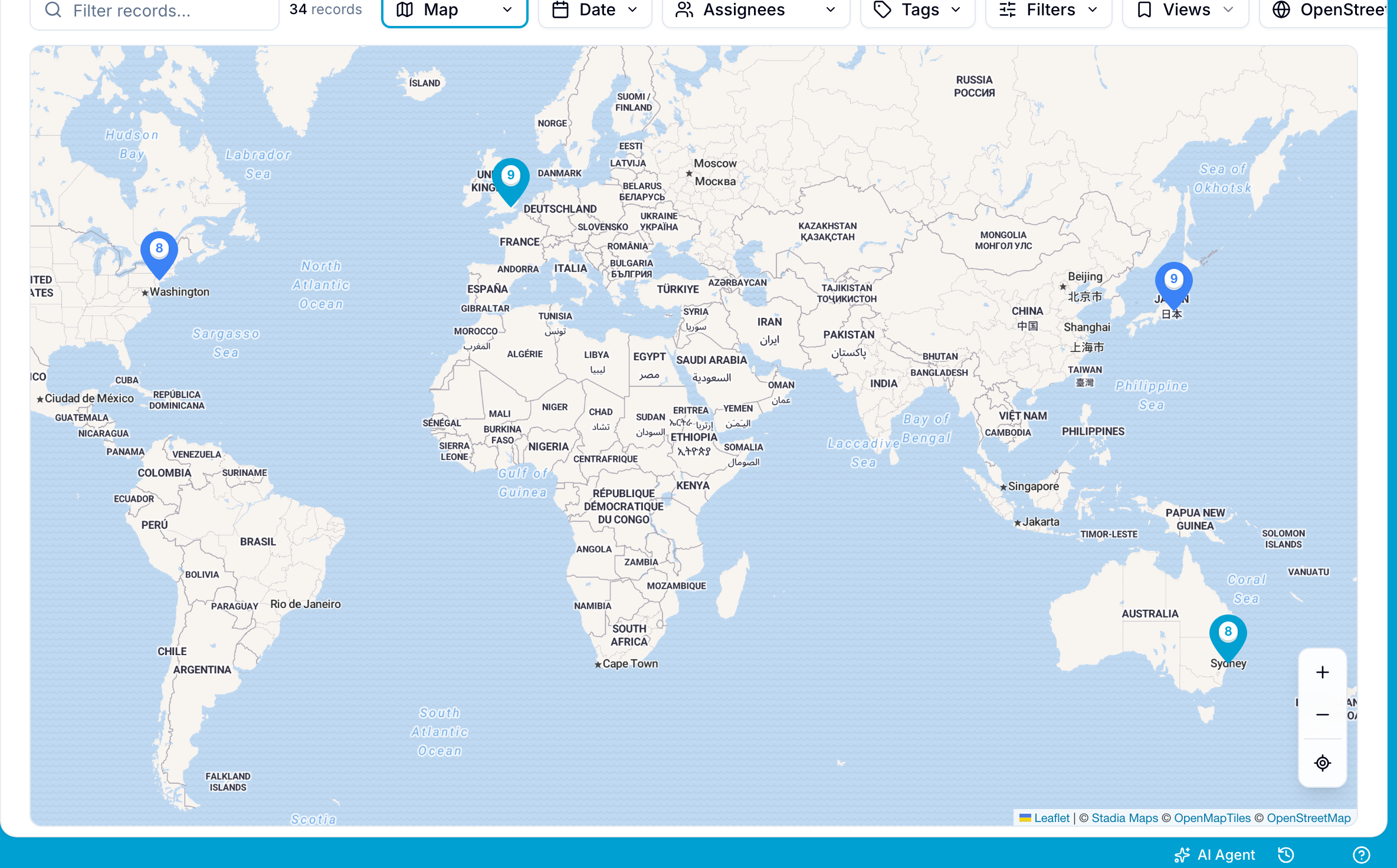 Map view showing four colour-coded pin clusters plotted on a world map, each badged with its record count